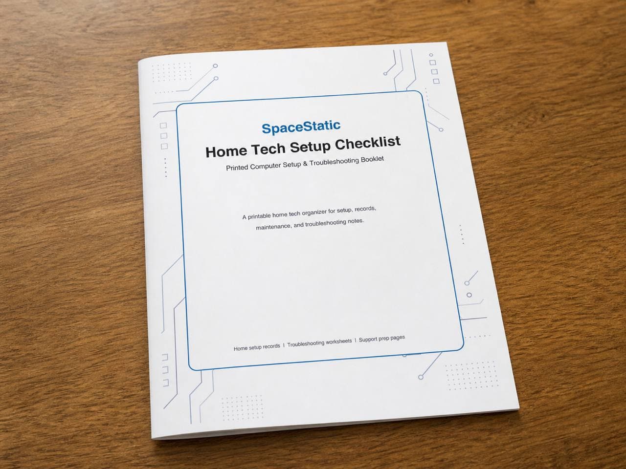 Printed SpaceStatic Home Tech Setup Checklist booklet on a wooden table